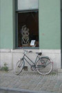 Bicycle Leaning Against a Wall on a Cobblestone Street in Europe Journal: 150 Page Lined Notebook/Diary