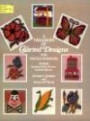 A Treasury of Charted Designs for Needleworkers: 141 Motifs Including Birds, Flowers, Animals, Toys, Etc. (Dover Needlework)